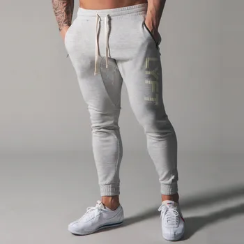 2021 Nuevos deportes para los Hombres pantalones de Fitness pantalones de Jogging de los hombres de Fitness bolsillo con Cremallera pantalones Slim Hombres de Ocio de algodón de Formación Lápiz Pantalones